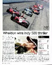 Wheldon wins Indy 500 thriller - Left